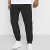 YOURTURN UNISEX - Pantaloni Sportivi - Black